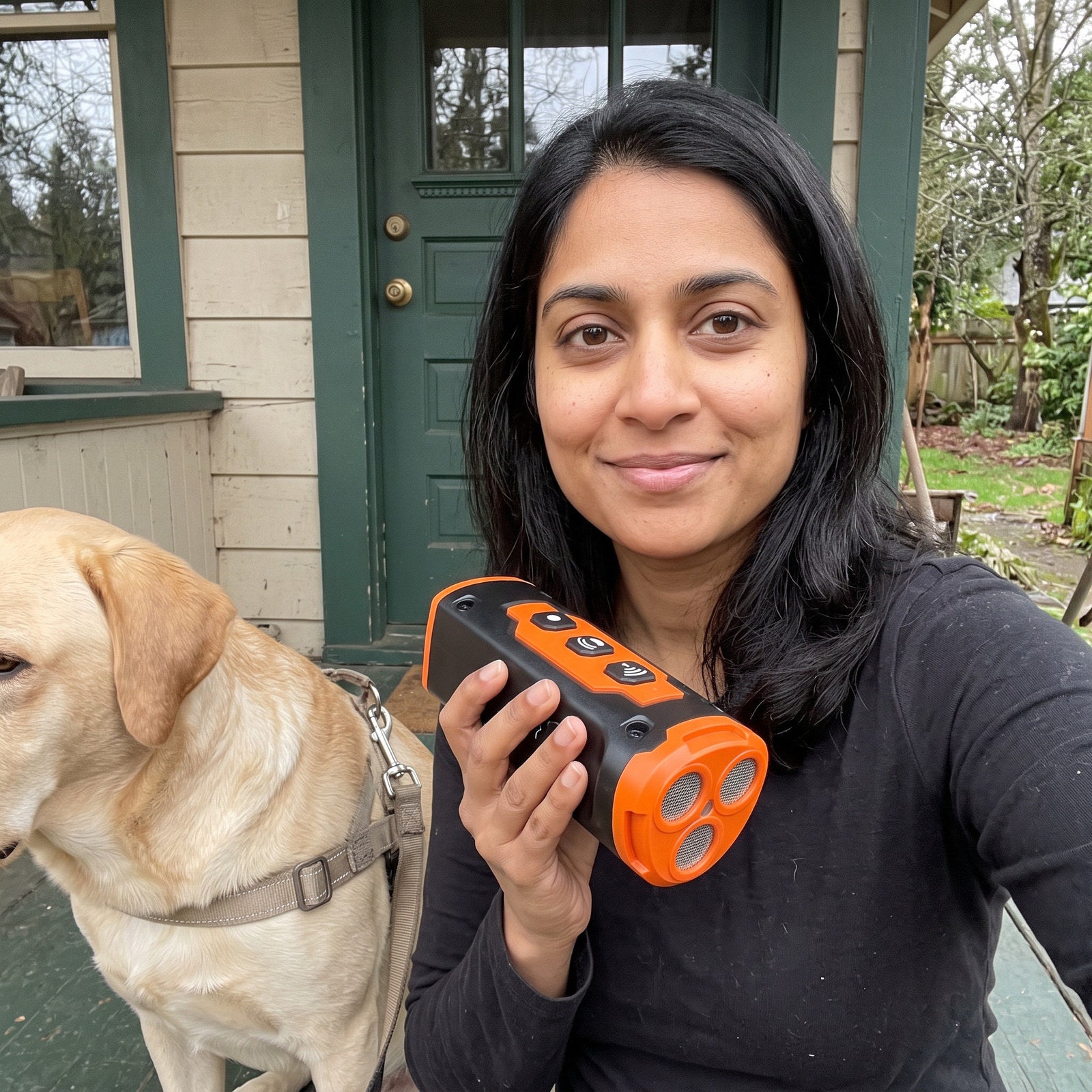 P. S. taking a porch selfie with Orange Black trainer and Labrador